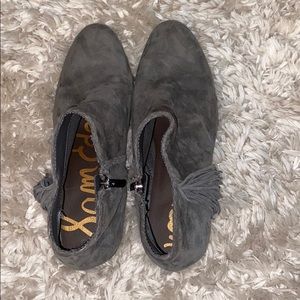 A super cute pair of gray ankle booties!